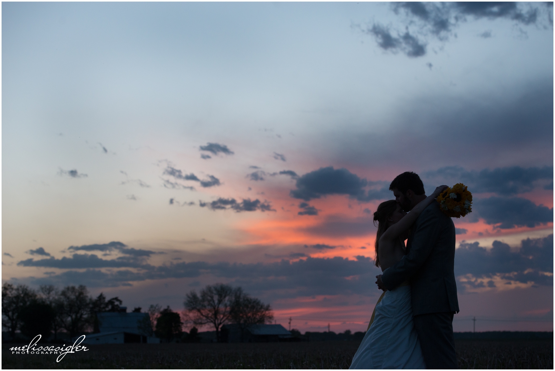 Beautiful sunset during Lawrence Kansas wedding Wedding reception at Victorian Veranda by Lawrence Kansas wedding photographer Melissa Sigler