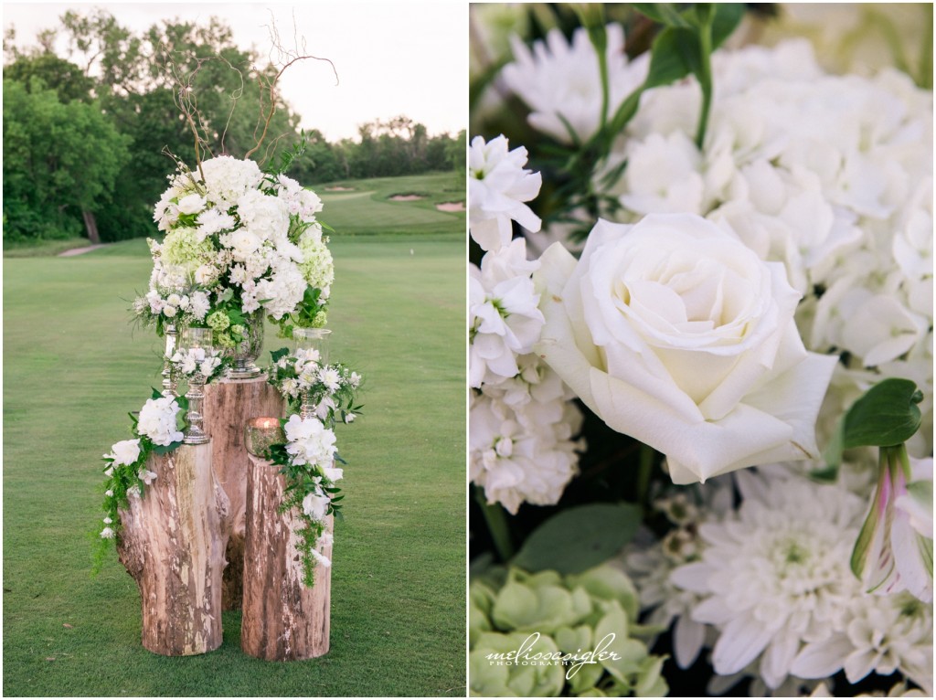 Gorgeous white flower arrangement on the alter at a Firekeeper golf course wedding