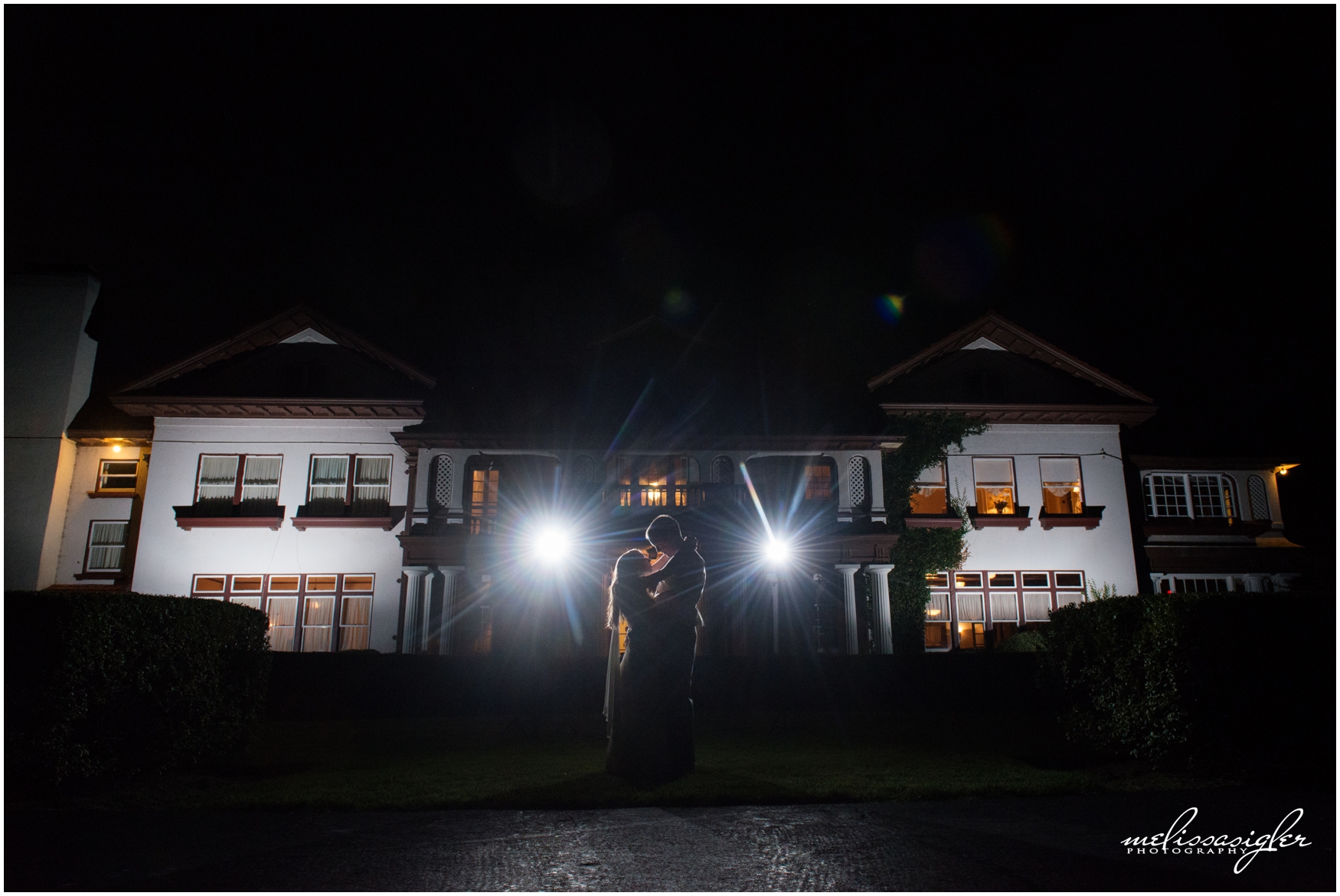 Bride and groom portrait in front of Longview Mansion by Melissa Sigler Photography