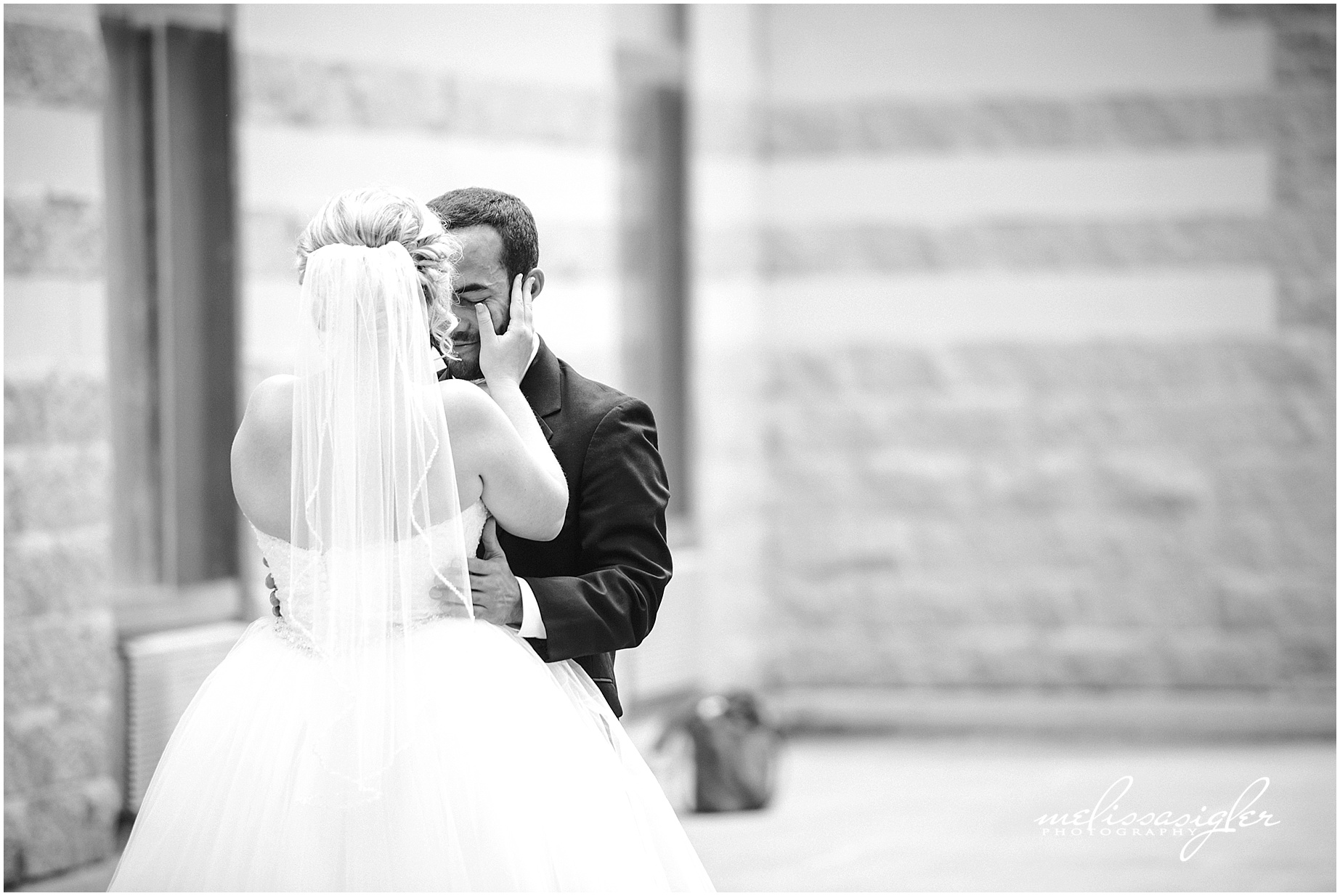 Bride and groom first look by wedding photographer Melissa Sigler