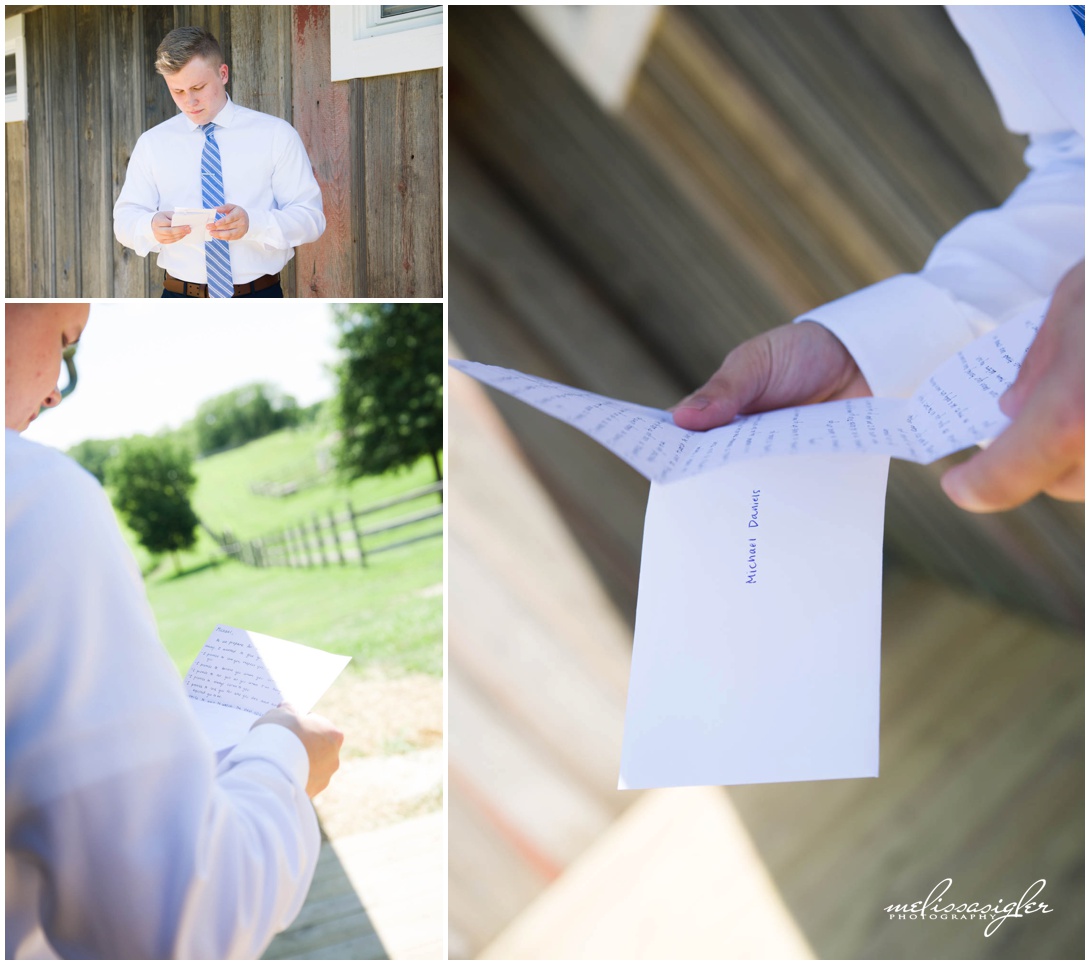 Groom reading love note from the bride