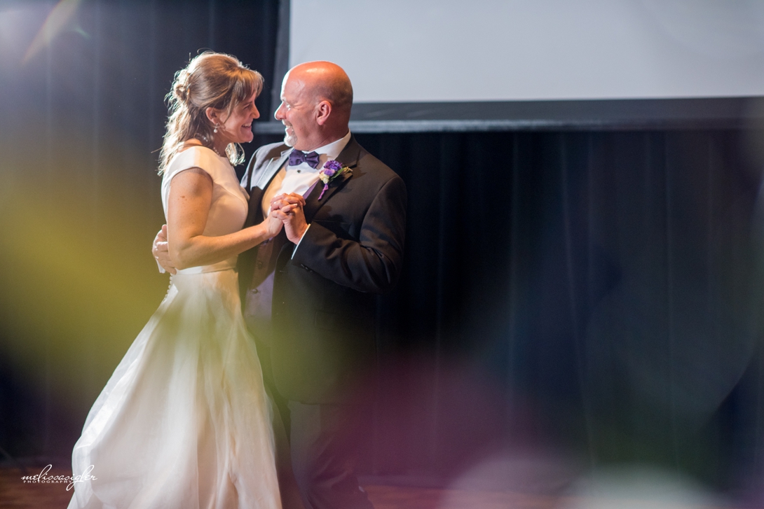 Bride and groom dancing in Lawrence Kansas