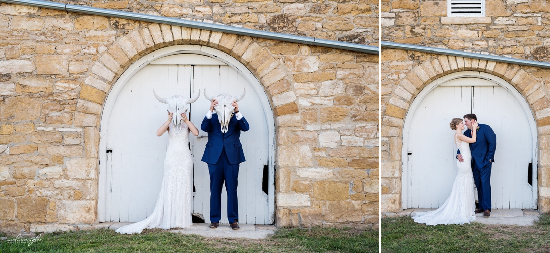 Bride and groom in front of Historic Taylor Barn