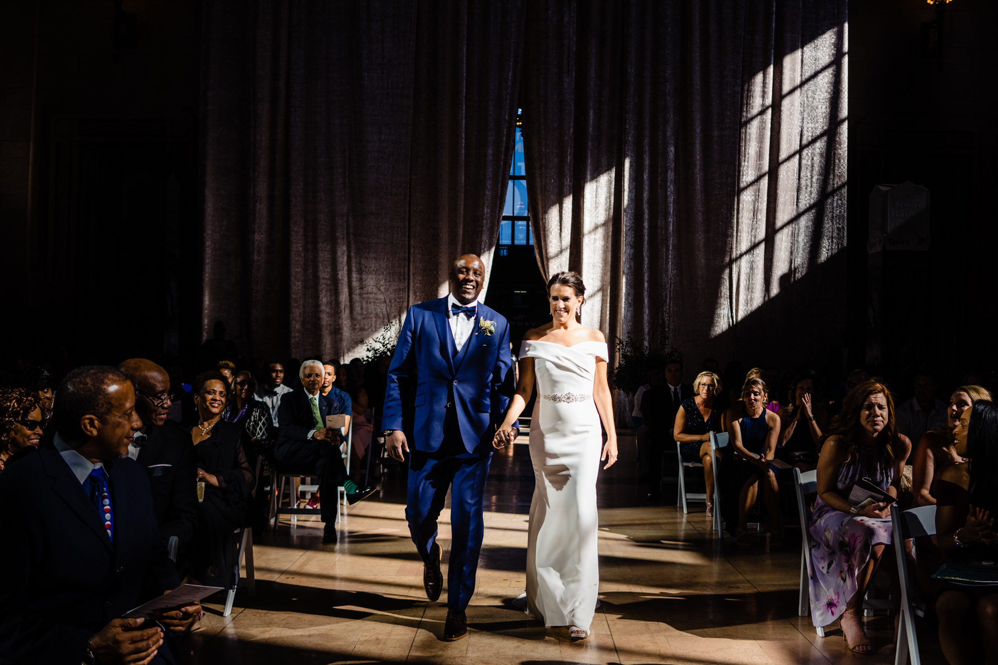 Newlyweds walk down the aisle after being married