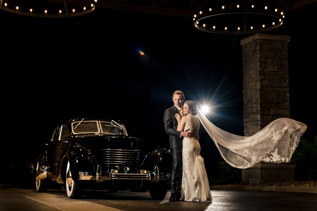 bride and groom with 1939 Cord