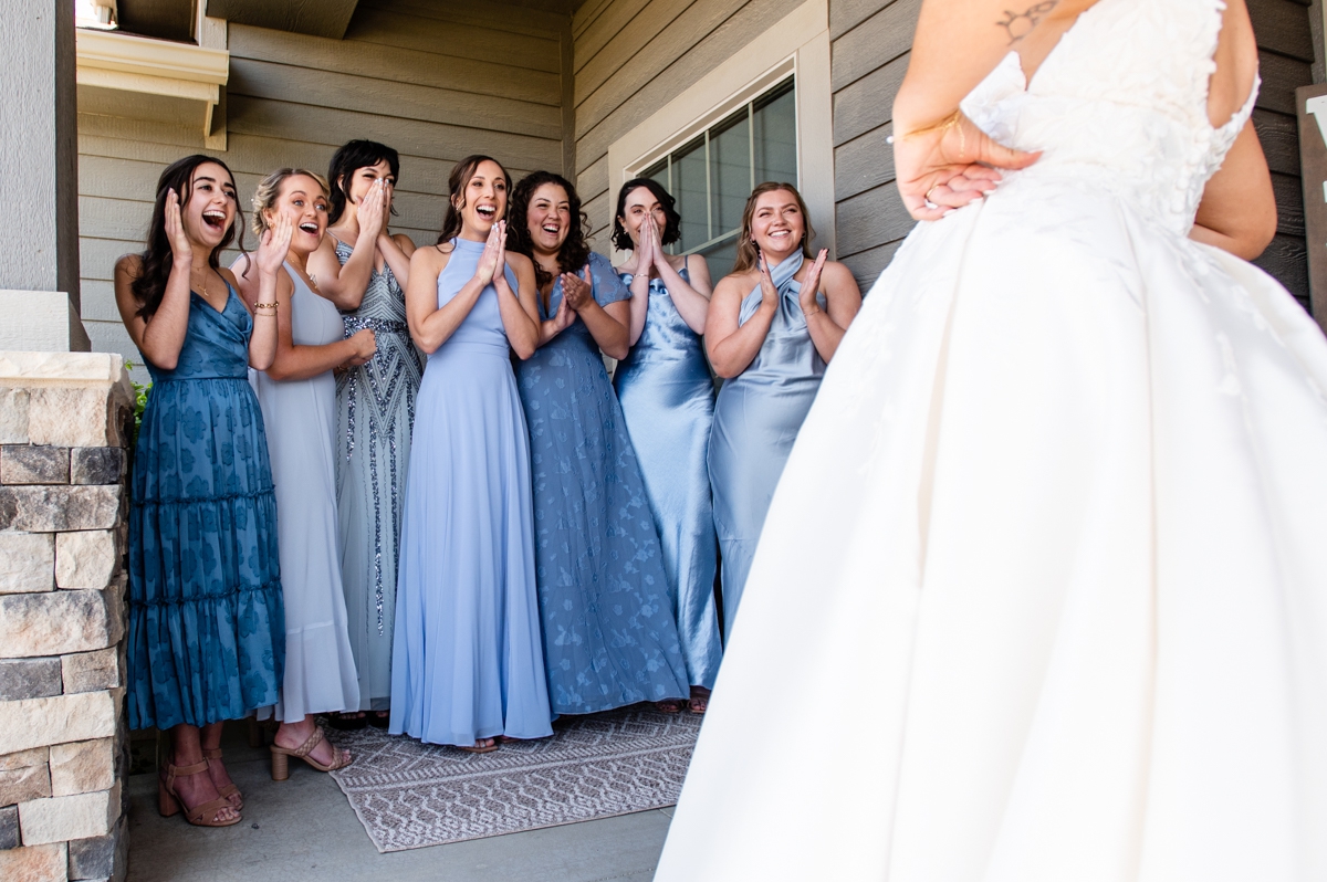 bridesmaids see the bride for the first time